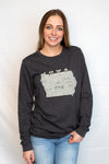A dark grey heather unisex crew neck long sleeve tee shirt with a graphic of Iowa and it's cities on it. A Scratchpad original design.