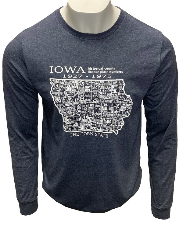 A male mannequin wearing a Heather Navy, unisex, long sleeved tee. The white front graphic is a map of Iowa counties with historical number and name. Wording reads Iowa, The Corn State. Available in sizes Small to 3 X-Large