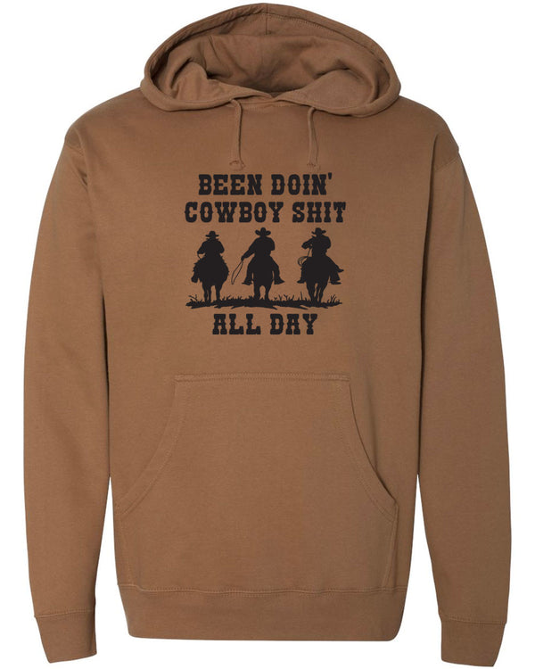 Brown Hooded Sweatshirt - silhouette of Cowboys on Horses - reads Been Doin' Cowboy Shit All Day.