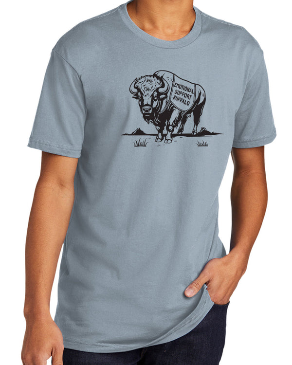Light Blue short sleeved tee shirt with black graphic of a Buffalo wearing a support animal vest that reads Emotional Support Buffalo.