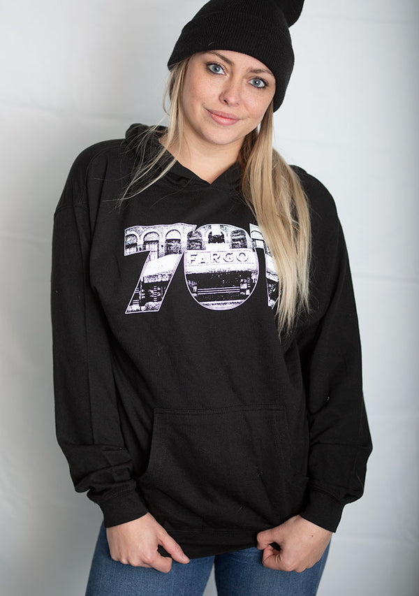 A Black sweatshirt with white graphic. the numbers 701 with the Fargo Theater appear on the front of the shirt.