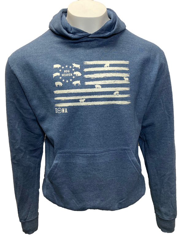 A male mannequin wearing a Heather Denim, pouch front, hooded fleece sweatshirt. The Light Grey front flag design  shows hogs in the stars field and standing on the flag stripes. Wording is Iowa Hog Heaven. Available in sizes Small to 3X-Large.