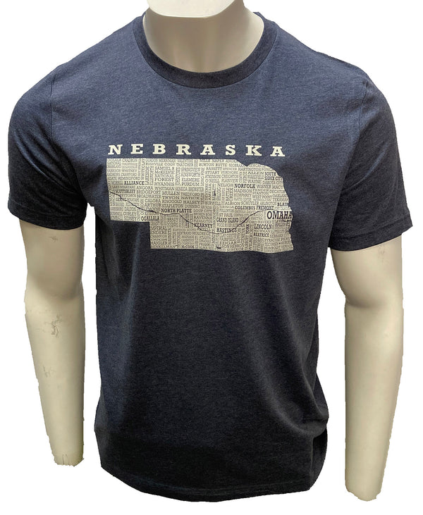 A unisex sized, Heather Navy crew neck, short sleeve tee. Front light grey graphic is of Nebraska and its cities. Sizes small to 3X-Lagre. A Scratchpad Tees original design.