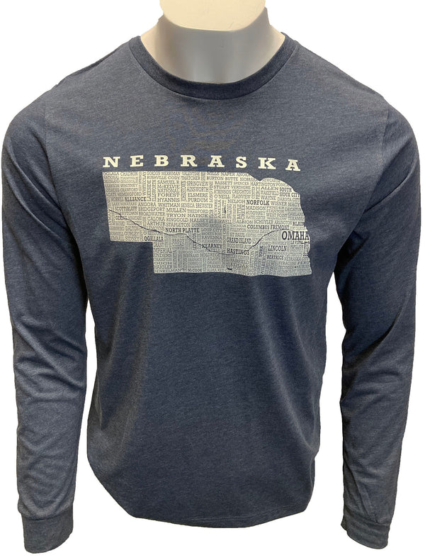 A male mannequin wearing a heather navy, cotton polyester, unisex long sleeved tee shirt with a light grey graphic of Nebraska and its cities on the shirt front. Sizes available small to 3X-Large. A Scratchpad Tees original design.