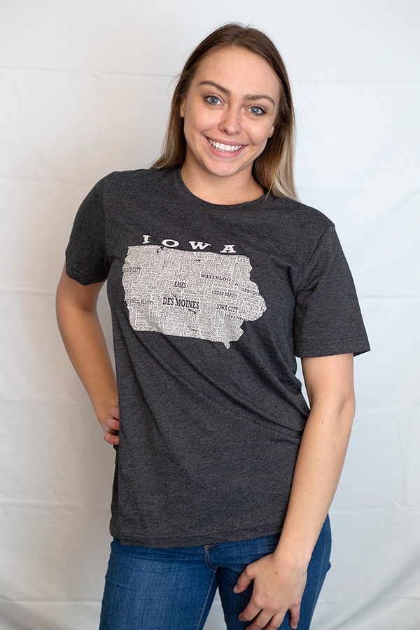 Original Scratchpad Tees design. A Dark Grey Heather unisex crew neck short sleeved tee with a graphic of Iowa and the town names in it.