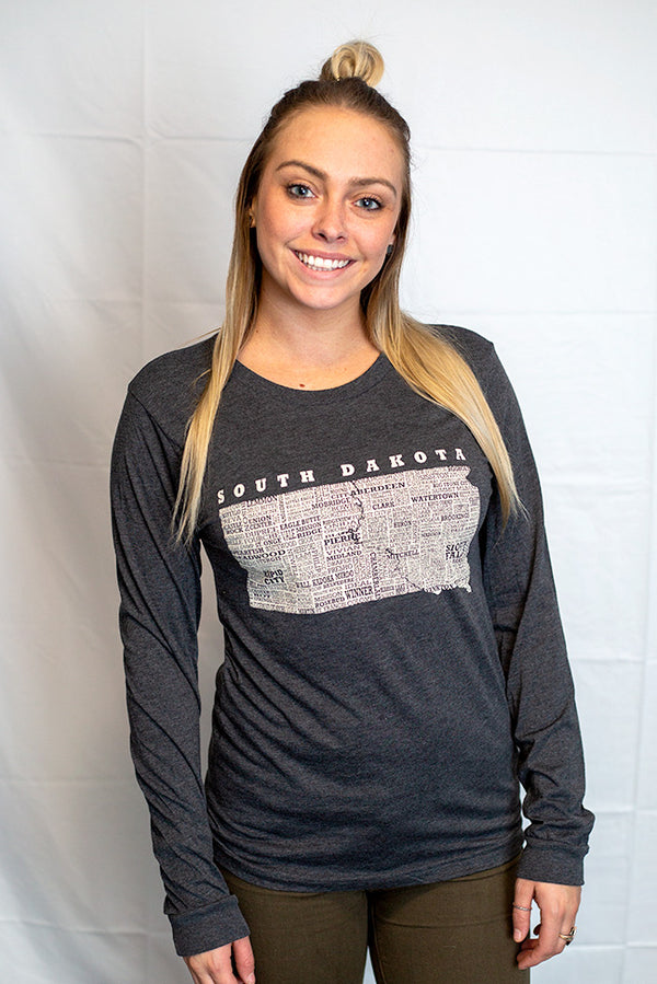 A unisex, long sleeved Dark Grey Heather  tee shirt. The front light grey graphic shows South Dakota and 95% of its cities. Scratchpad Tees original design available in sizes small to 3X-Large.