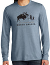A male model wearing a Flint Blue Tri-blend crew neck long sleeved tee shirt. The front graphic includes a charging buffalo launching a tourist family up in the air. The caption reads; Tossin' Tourists since 1889 in North Dakota.