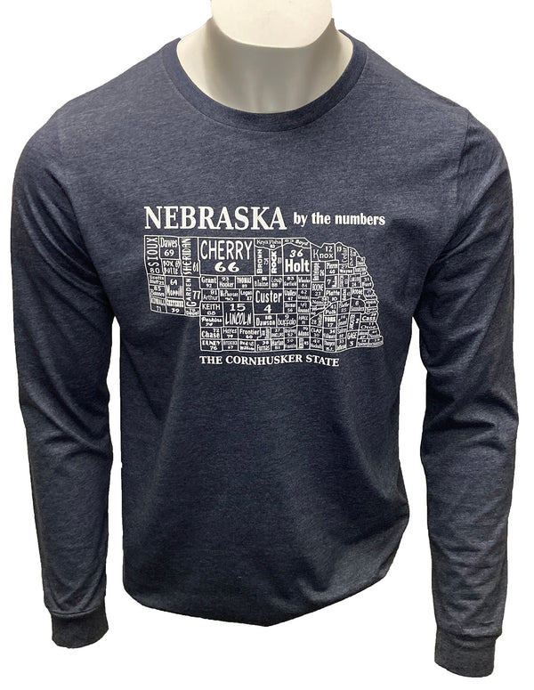 A male mannequin wearing a unisex, Heather Navy, long sleeved tee shirt. The white front graphic is a map of Nebraska's counties by name and number. Wording reads Nebraska, The Cornhusker state.Available in sizes Small to 3 X-Large