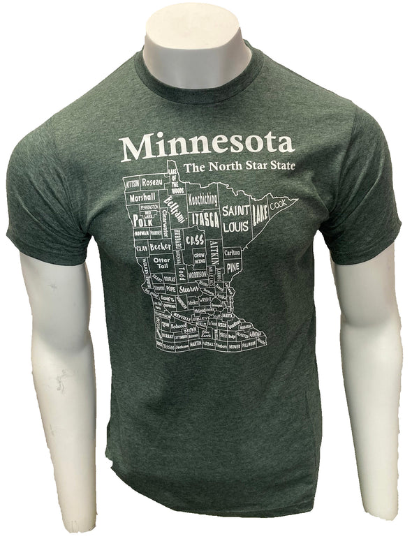 A male mannequin wearing a  Heather Hunter colored, unisex, short sleeved crew neck shirt. The white front graphic is a map of Minnesota's counties, by name. Wording above design is Minnesota, The North Star State. Available in sizes Small to 3 X-Large