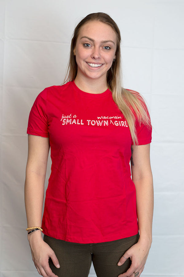 A Heather Red Ladies cut short sleeve tee shirt. White front graphic reads Just A Small Town Wisconsin Girl.